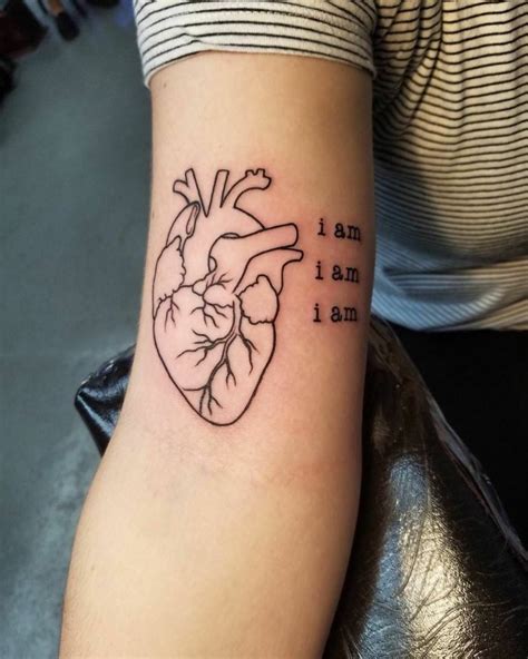 tatuaje de corazón humano